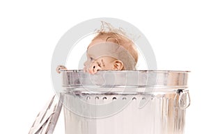 Baby in trash can