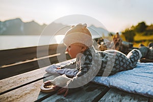 Baby traveler enjoying mountains view family activity