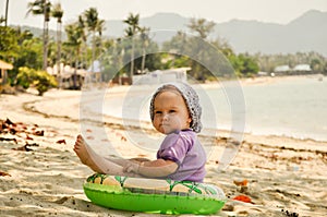 Baby on tropical beach