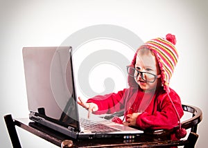 Baby typing on keyboard