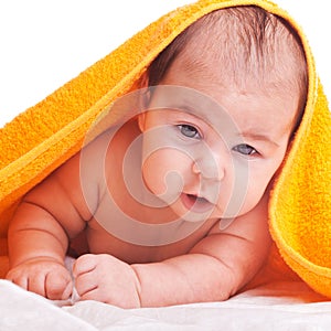 Baby under towel