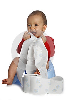 Baby with unrolled papper