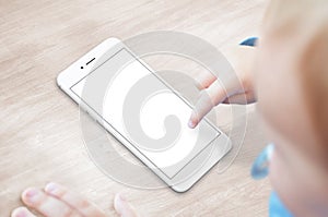 Baby use smart phone with isolated screen for app presentation