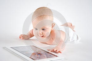 Baby using digital tablet