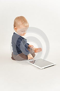 Baby using digital tablet