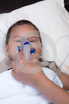 Baby using spacer for respiratory syncytial virus