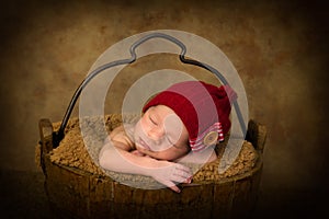 Baby in vintage bucket