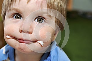 Baby with wadded stick in mouth