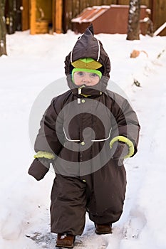 Baby walk at winter day