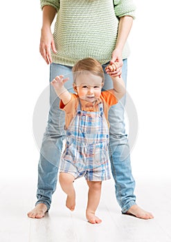 Baby Walking First Steps, Mother Helping Child to Go, on White