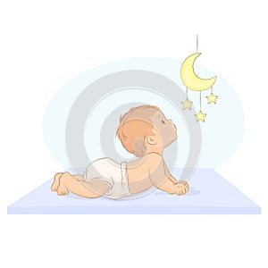 Baby watching moon and stars mobile toy