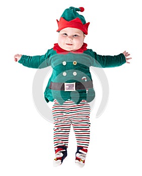 Baby wearing elf outfit - babies first Christmas