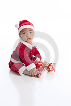 Baby Wearing a Santa Suit