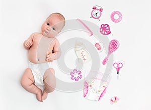 Baby on white background with clothing, toiletries, toys and health care accessories for girls. Wish list or shopping