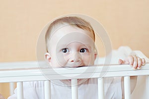 Baby in white bed