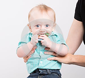 Baby Worried with Paper in Mouth