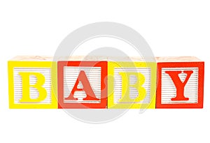 Baby written in wooden blocks