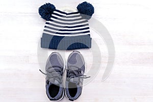Babys blue hat,beanie and sneakers. Set of children\'s clothes