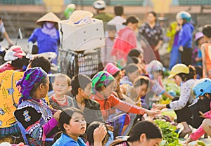 Woman selling vegetable in Bac Ha market in Northern Vietnam