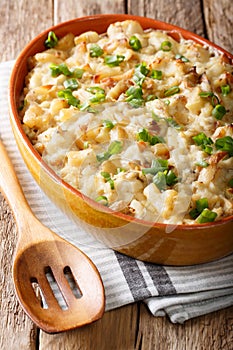 Bacalhau com natas - casserole with cod, potatoes, onions and cr