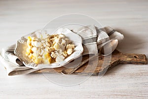 Bacalhau com natas Portuguese cuisine Traditional Portugal dish baked cod with potatoes, onions and cream