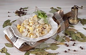 Bacalhau com natas Portuguese cuisine Traditional Portugal dish baked cod with potatoes, onions and cream