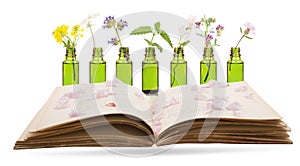 Bach flower remedies, phytotherapy - bottle and old book