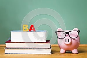 Bachelor of Arts degree theme with textbooks and piggy bank