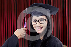 Bachelor with mortarboard and tassel