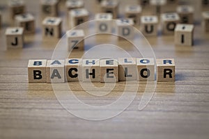 Bachelor written in wooden cubes