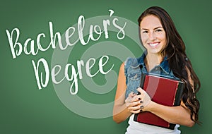 Bachelors Degree Written On Chalk Board Behind Mixed Race Young