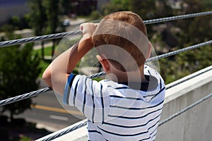 Back of boy's head looking at view