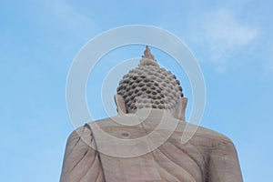 The back of the Buddha is a backlight with blue Sky
