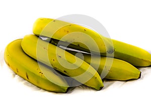 The back of a bunch yellow and green banana `s