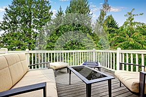 Back deck with outdoor furniture and nice view