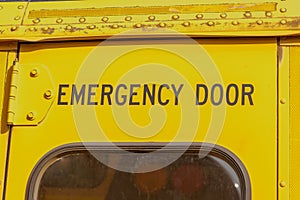 Back door on the bus. Emergency exit on a yellow school bus.