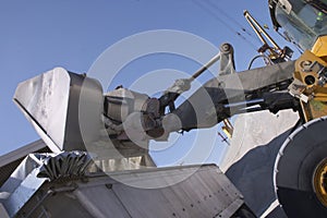 Back Hoe loading a truck