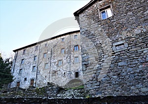 Back of a large and historic stone house in San Romano in Garfagnana.