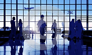 Back Lit Business People Traveling Airport Passenger Concept