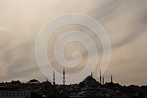 Back lit view of historical mosques in Eminonu