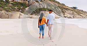 Back, love and couple on a beach, walking and summer vacation for anniversary, relationship and bonding. Romance, man or