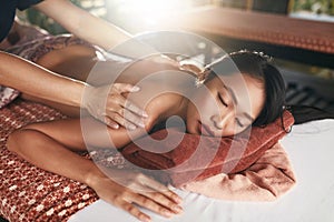 Back Massage At Thai Spa. Woman Having Body Massage At Salon