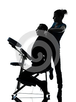 Back massage therapy with chair silhouette