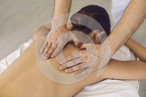 Back massage treatment in medical clinic from professional doctor masseur