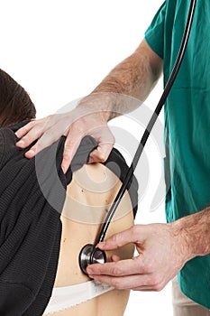 Back medical auscultation with stethoscope close up. Caucasian. photo