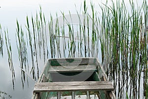 Back of an old boat in the water