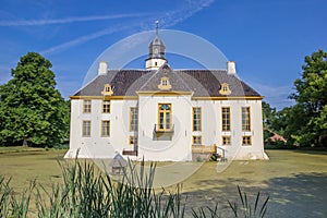 Back of the old dutch mansion Fraeylemaborg in Slochteren photo