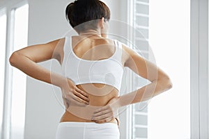 Back Pain. Closeup Of Woman Body With Pain In Back, Backache