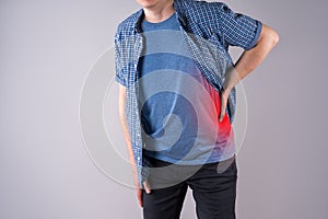 Back pain, kidney inflammation, ache in man`s body