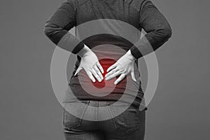 Back pain, kidney inflammation, ache in woman`s body